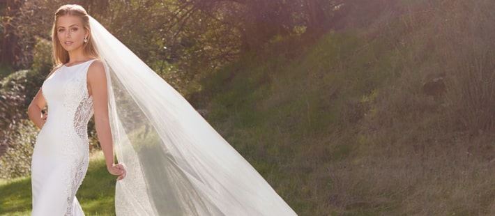 Model in white Kitty Chen wedding dress