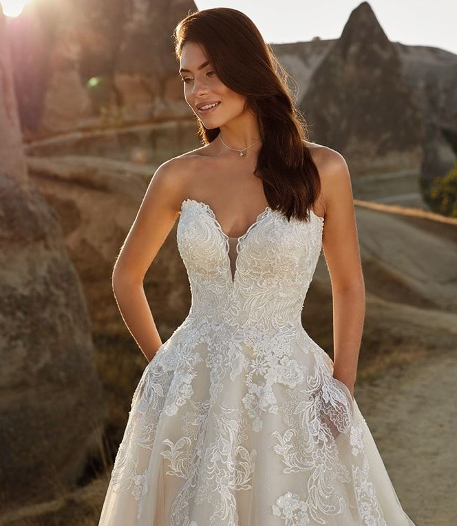 Brunette in an Eddy K wedding dress